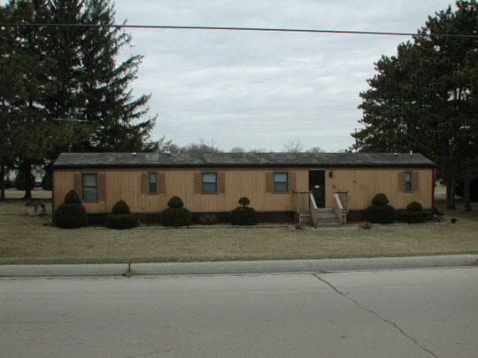 619 Simpson Road Rockford, IL 61102 - Photo 1 of 1 a front view of house with yard