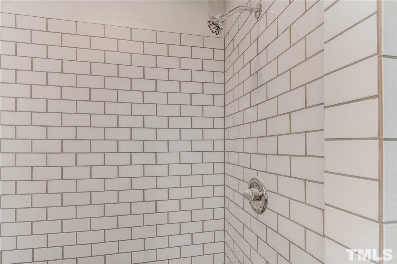 3317 Broughton Road Wendell, NC 27591 - Photo 9 of 11 a bathroom with a shower