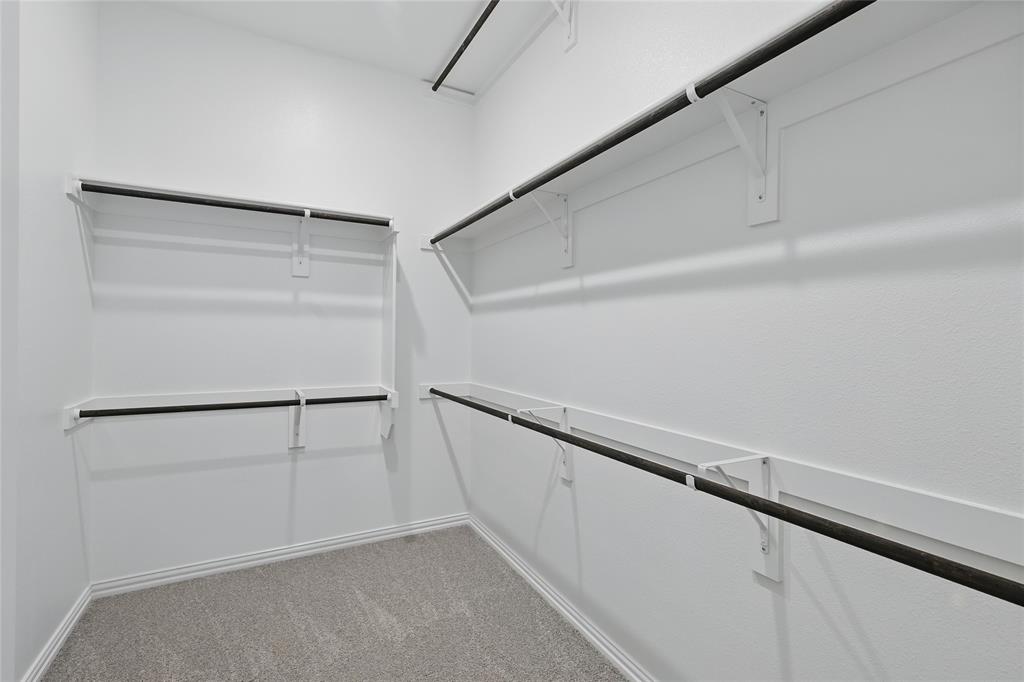 949 Schuberts Road Justin, TX 76247 - Photo 18 of 24 Walk in closet with light carpet