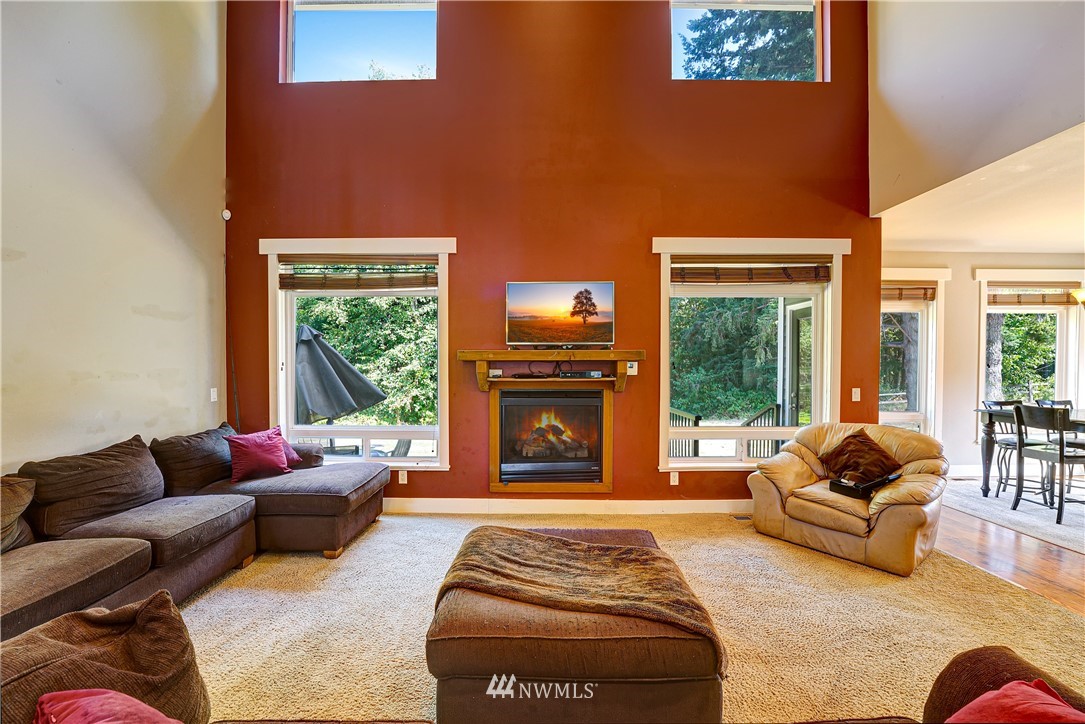 1290 West Axton Road Ferndale, WA 98248 - Photo 21 of 36 a living room with furniture and a large window