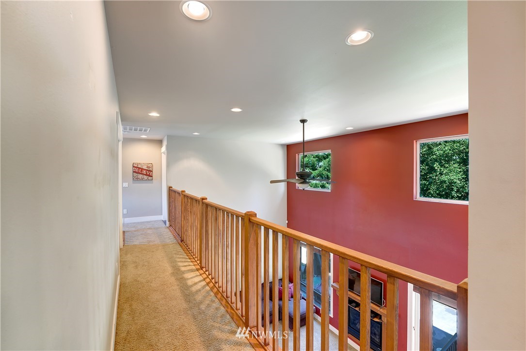 1290 West Axton Road Ferndale, WA 98248 - Photo 23 of 36 a view of a hallway with wooden floor