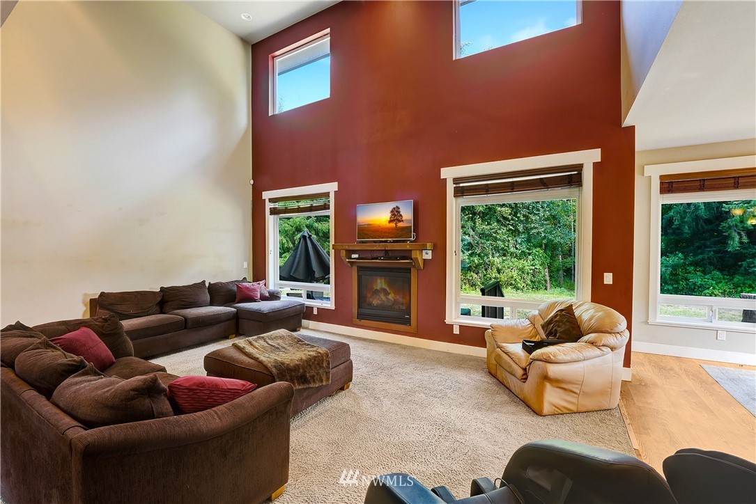 1290 West Axton Road Ferndale, WA 98248 - Photo 9 of 36 a living room with furniture and a large window