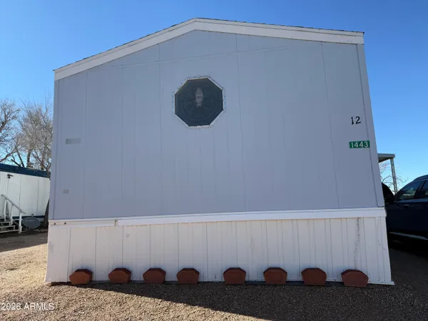 a view of table with a refrigerator