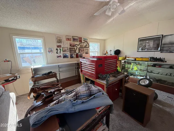 a room with furniture and a flat screen tv