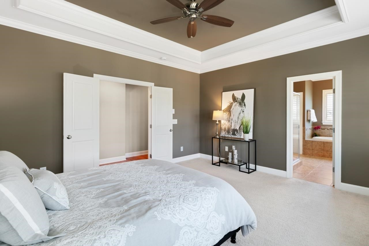 2800 Romealia Lane Raleigh, NC 27613 - Photo 19 of 33 The owner's suite features a tray ceiling, lending added depth and elegance to your sanctuary. Owner's Suite