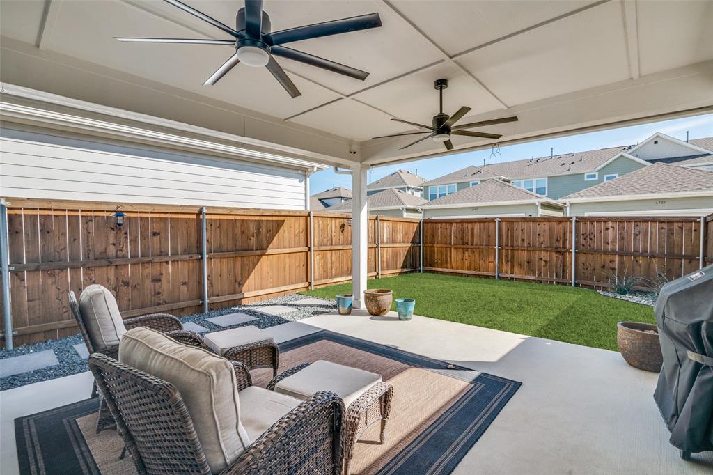 6420 Trezevant Street Rowlett, TX 75089 - Photo 14 of 28 Extended covered patio w ceiling fans