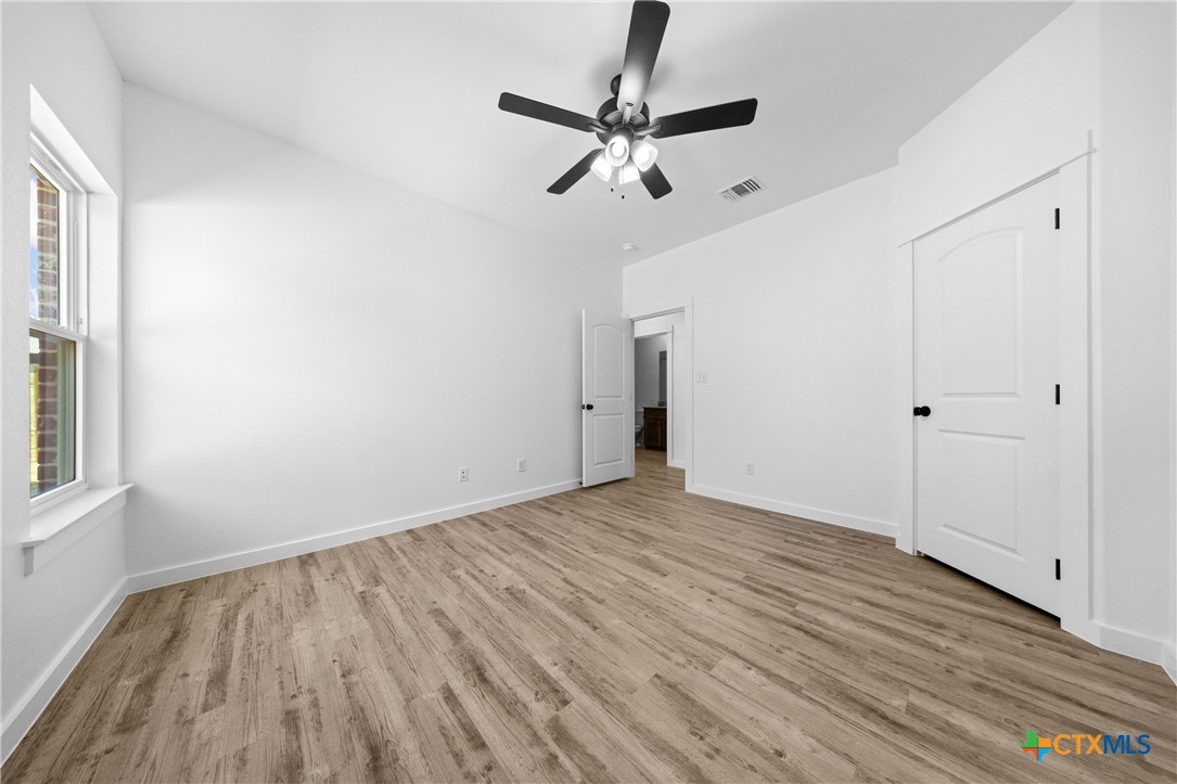 3606 Canvasback Road, Unit B Killeen, TX 76542 - Photo 12 of 19 a view of empty room with wooden floor