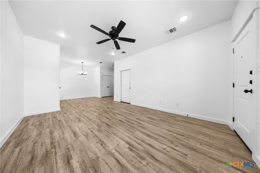 3606 Canvasback Road, Unit B Killeen, TX 76542 - Photo 19 of 19 an empty room with wooden floor and windows