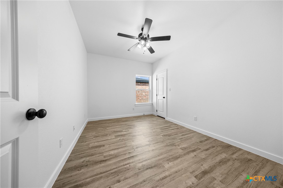 3606 Canvasback Road, Unit B Killeen, TX 76542 - Photo 10 of 19 wooden floor in an empty room