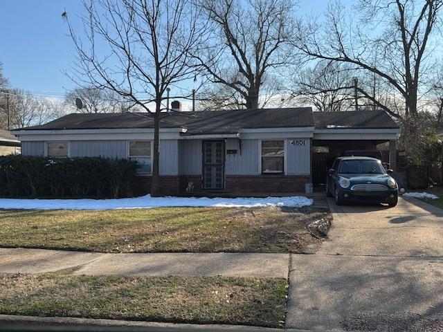 4801 Given Avenue Memphis, TN 38122 - Photo 2 of 3 a view of a house with a yard covered with snow in front of house