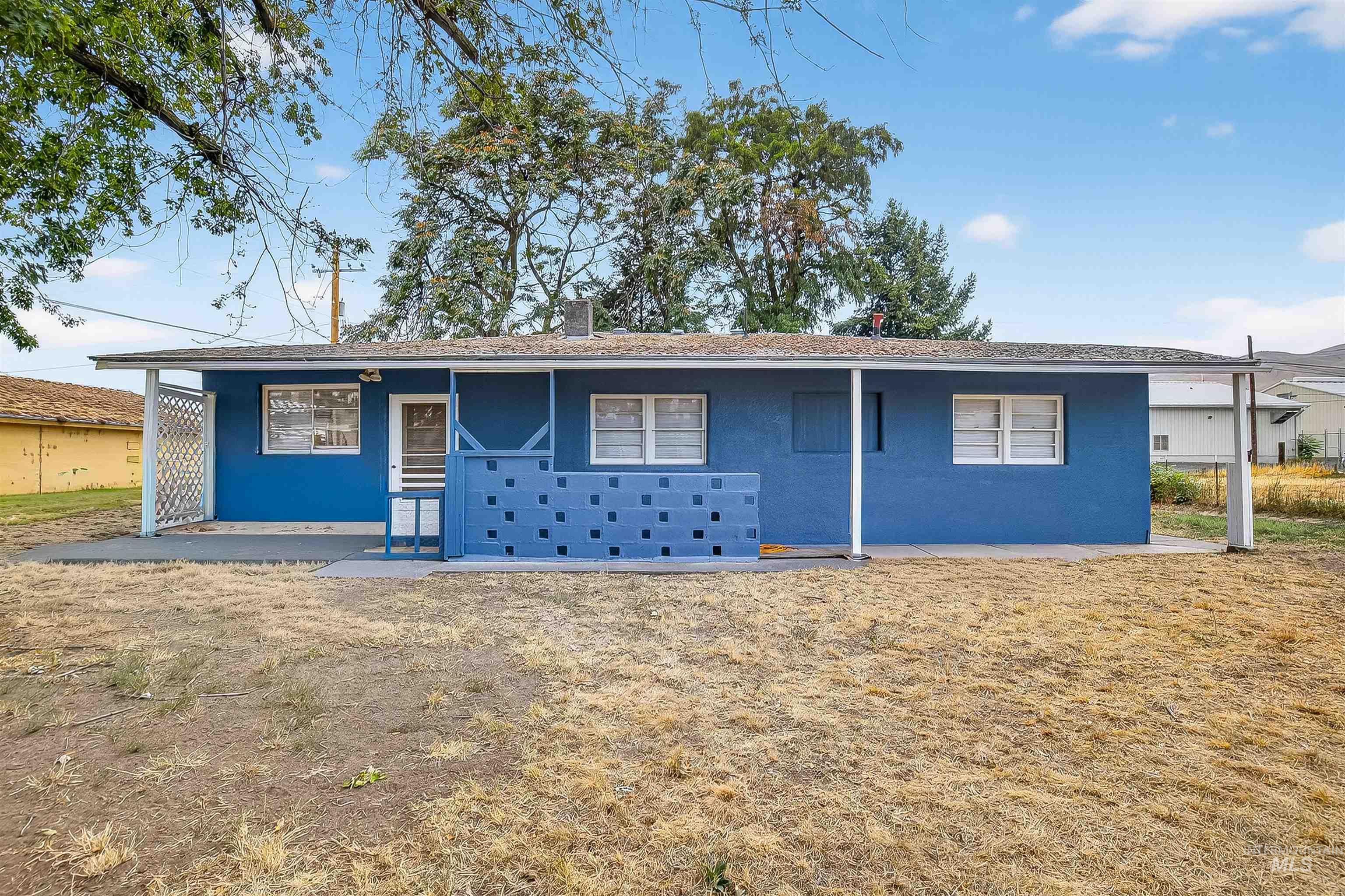 705 28th Street North Lewiston, ID 83501 - Photo 19 of 34 Ranch-style home with stucco siding and a chimney