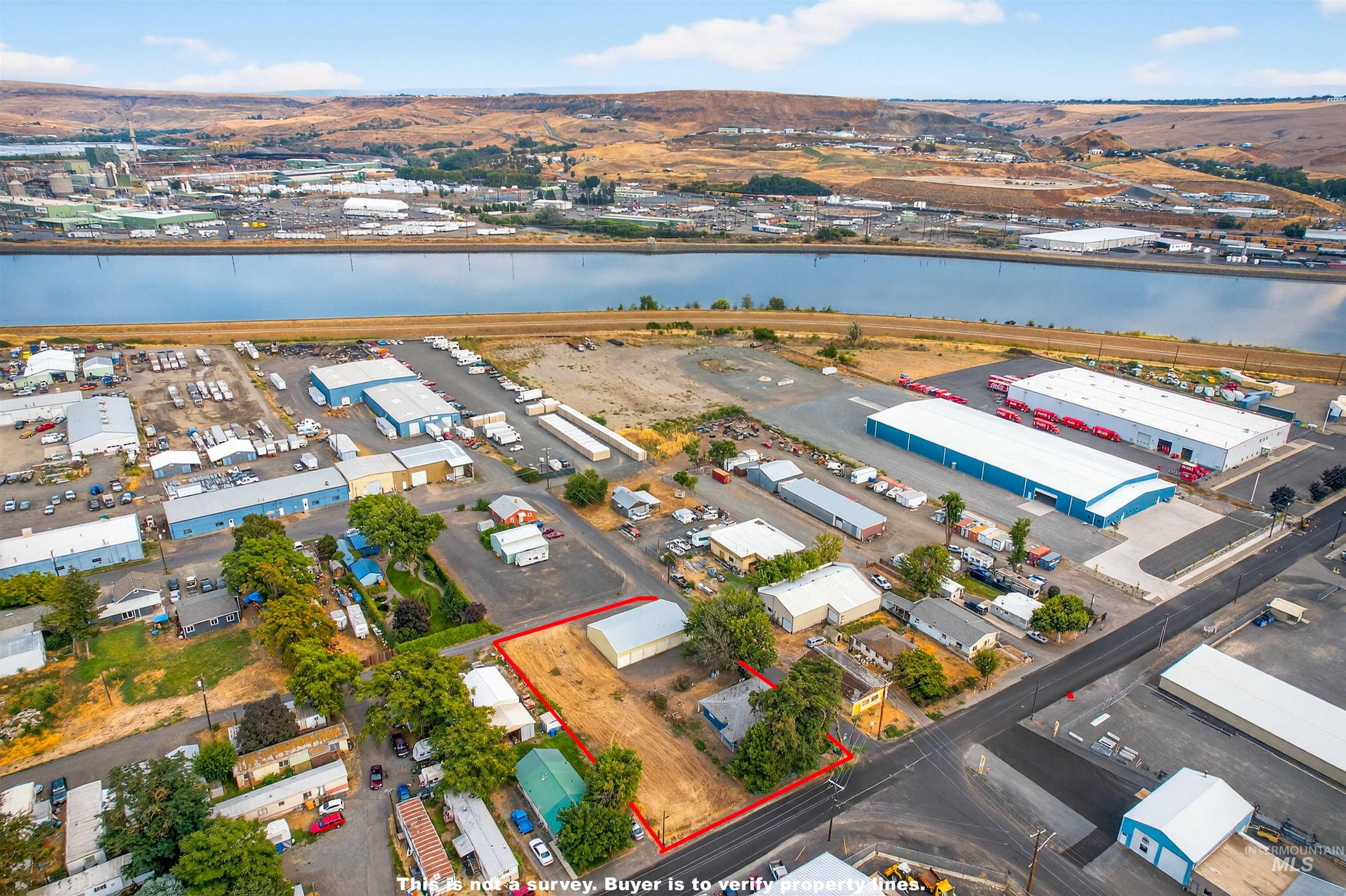 705 28th Street North Lewiston, ID 83501 - Photo 5 of 34 Bird's eye view of an industrial area and a nearby body of water