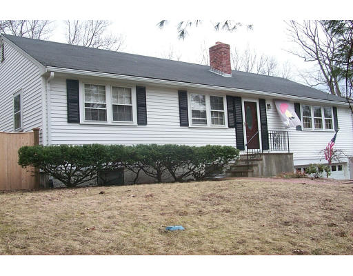 105 Rockwood Road Norfolk, MA 02056 - Photo 2 of 8 a front view of a house with a yard