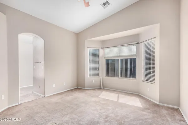 an empty room with windows