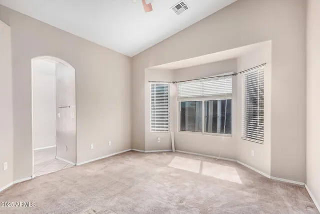 an empty room with windows