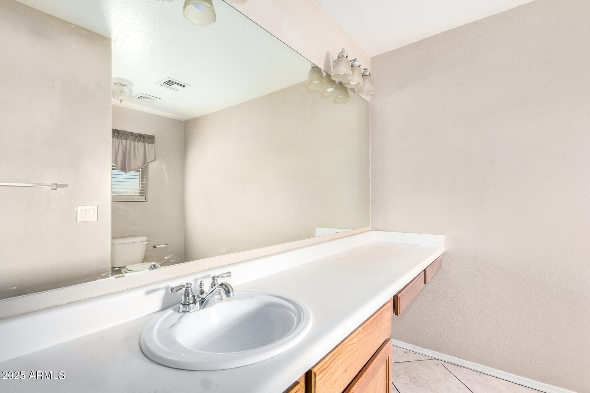 2101 South Meridian Road, Unit 403 Apache Junction, AZ 85120 - Photo 14 of 24 a bathroom with a sink and a mirror