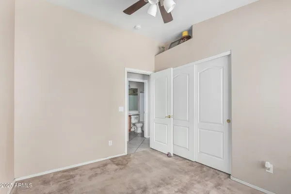 a bedroom with a bed and furniture