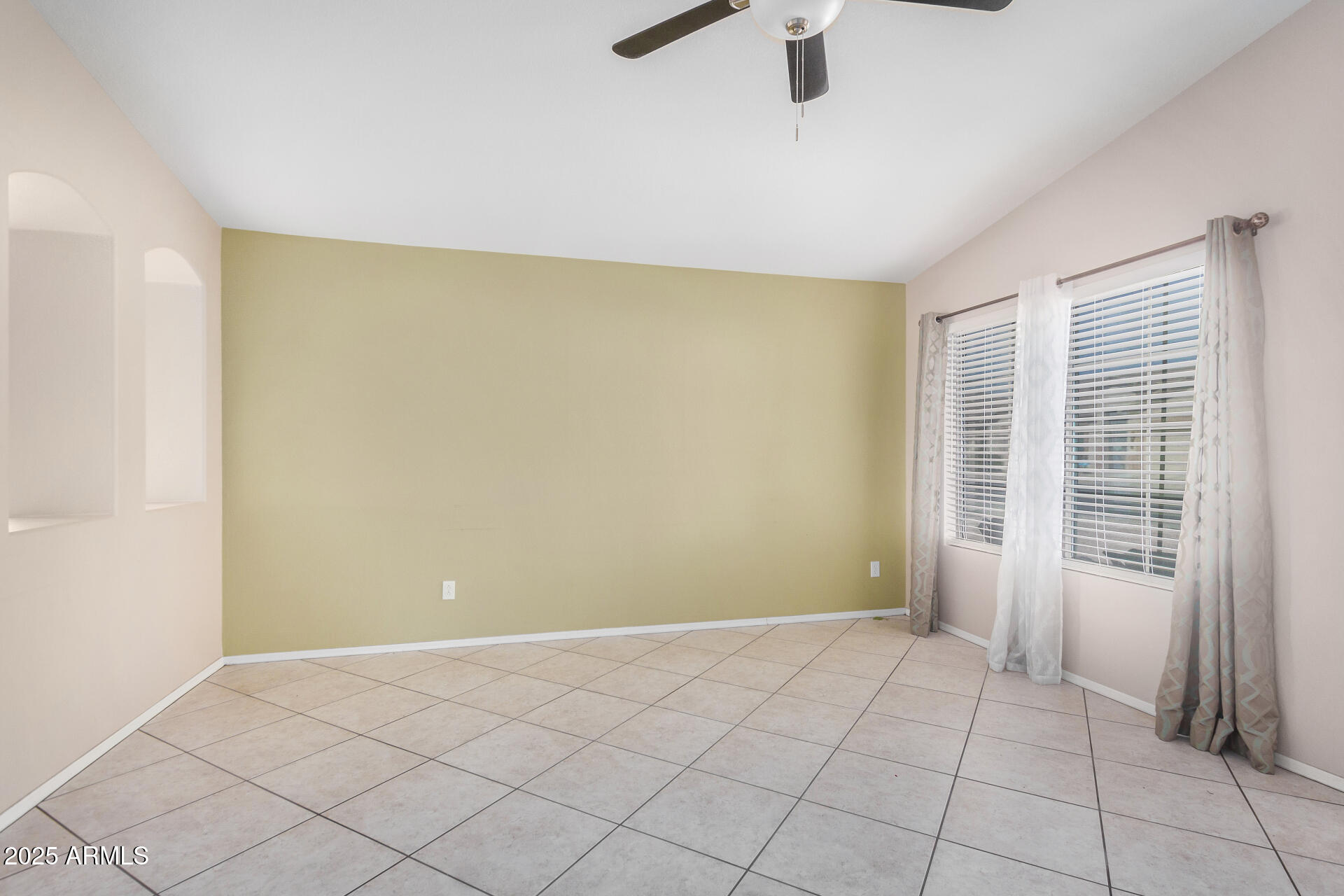 2101 South Meridian Road, Unit 403 Apache Junction, AZ 85120 - Photo 4 of 24 a view of an empty room with a window