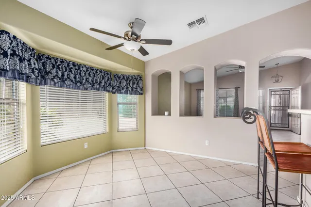 a view of an entryway with a chandelier