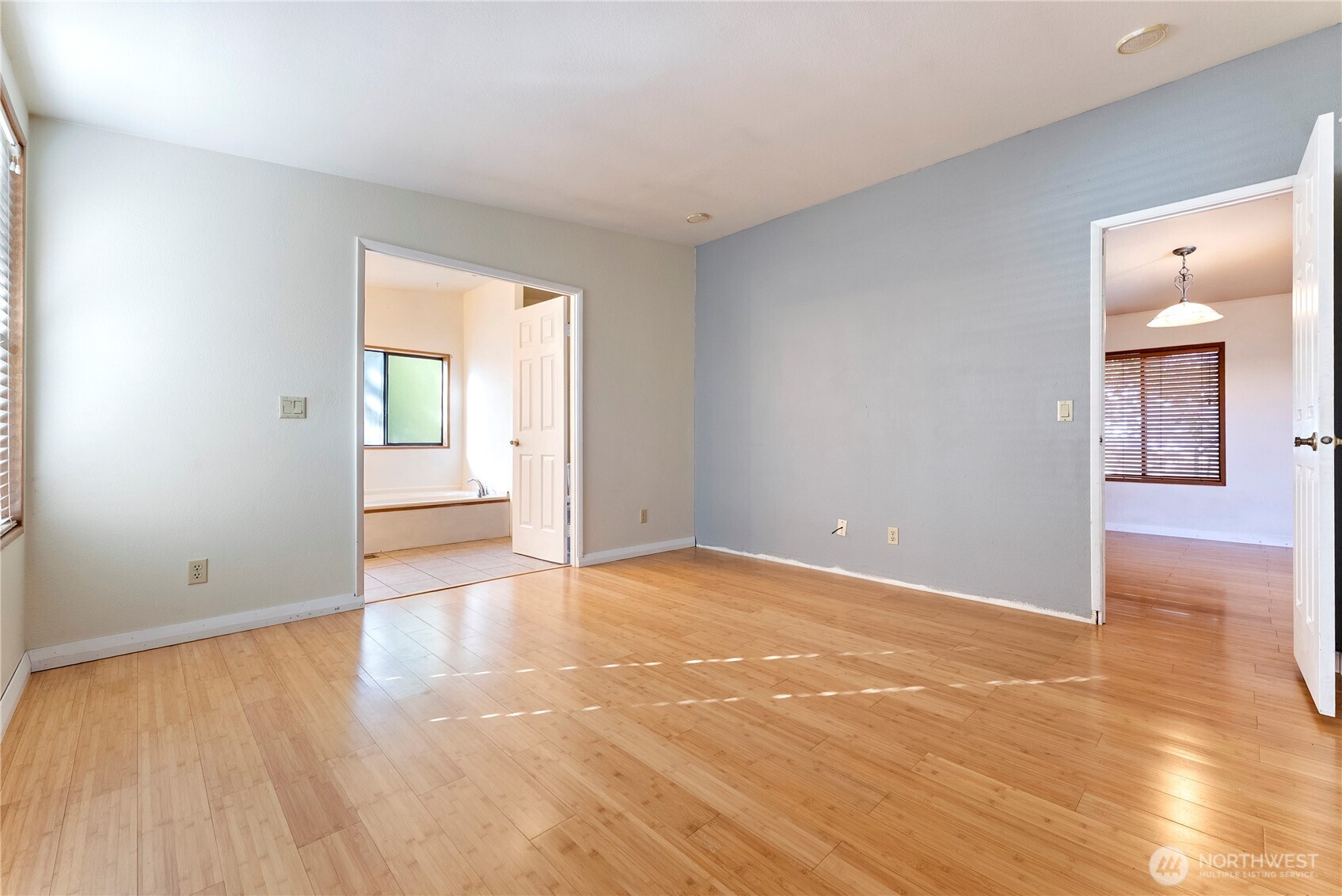 1221 Riverside Avenue Twisp, WA 98856 - Photo 25 of 40 a view of an empty room with window and wooden floor