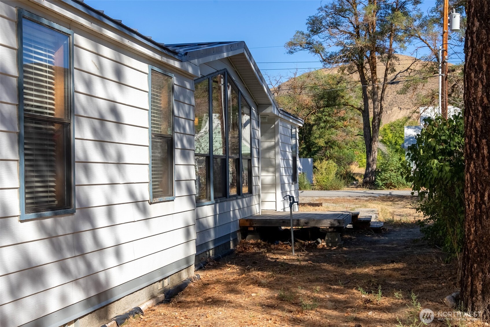 1221 Riverside Avenue Twisp, WA 98856 - Photo 35 of 40 a view of house with a outdoor space