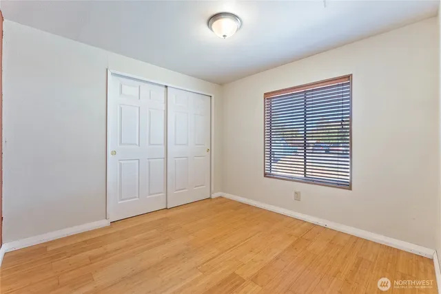 a utility room with closet dryer and washer