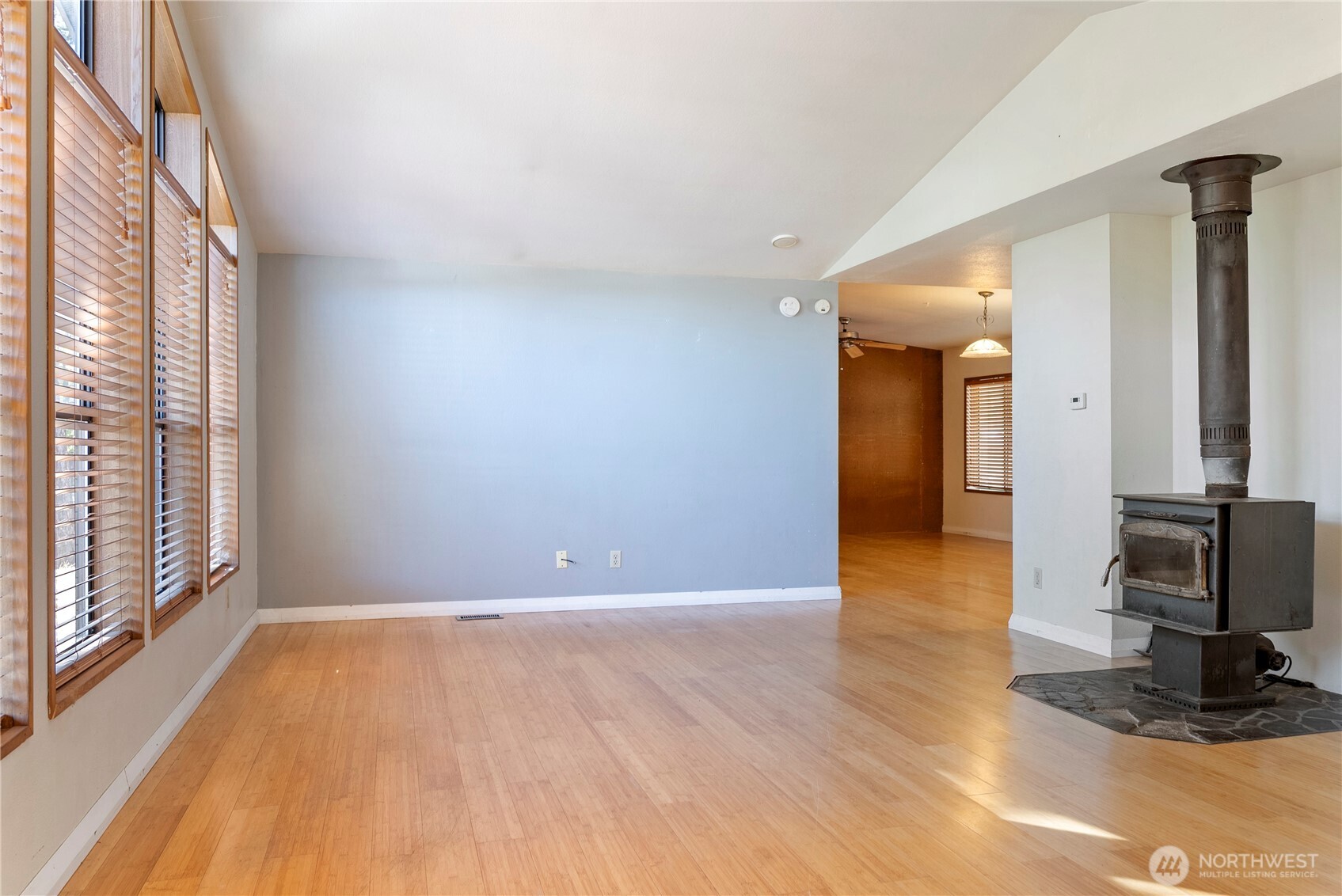 1221 Riverside Avenue Twisp, WA 98856 - Photo 8 of 40 a view of a livingroom with wooden floor and furniture