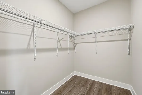 a view of a room with racks on the wall