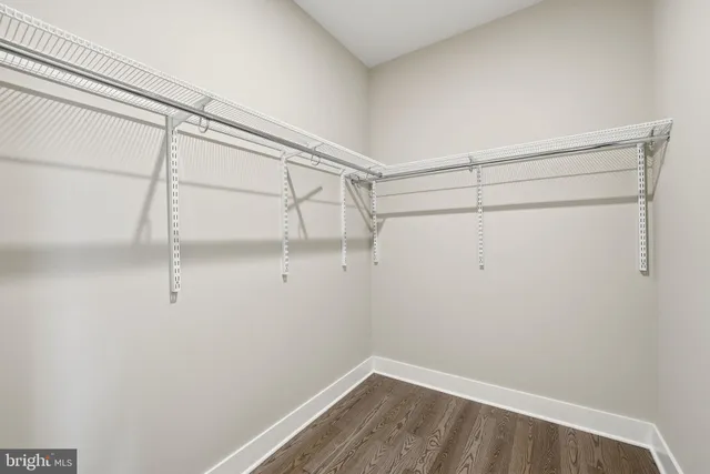 a view of a room with racks on the wall