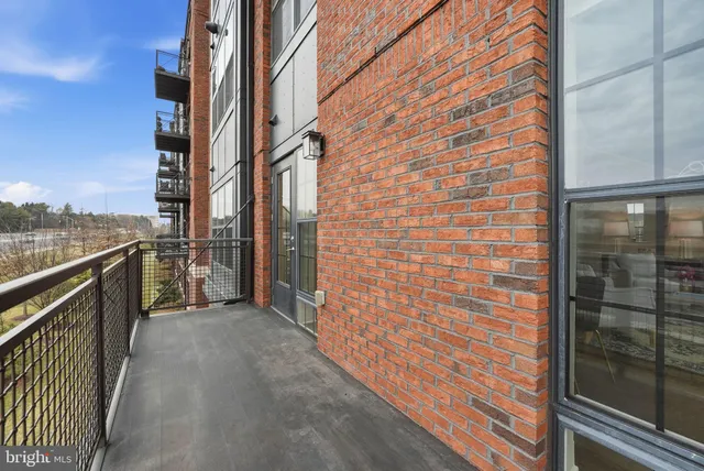 a view of a balcony with an outdoor space