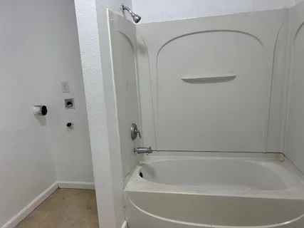a bathroom with a bathtub