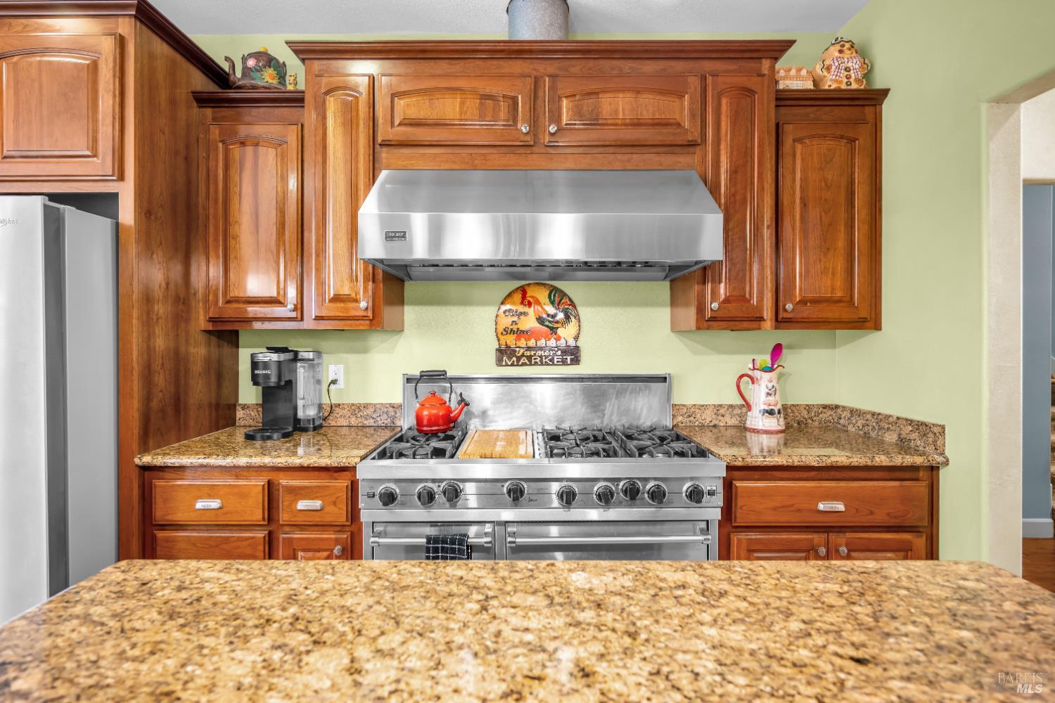 3970 Canyon Road Willits, CA 95490 - Photo 15 of 67 a kitchen with stainless steel appliances granite countertop a stove and cabinets