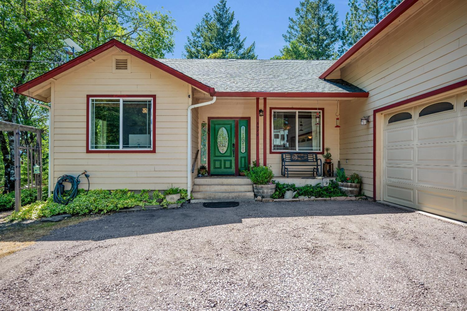 3970 Canyon Road Willits, CA 95490 - Photo 2 of 67 a front view of a house with garden