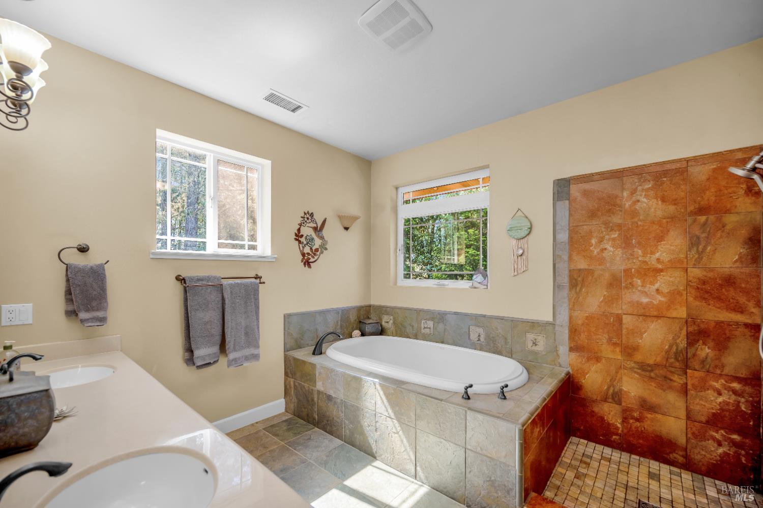 3970 Canyon Road Willits, CA 95490 - Photo 21 of 67 a bathroom with a tub sink and mirror
