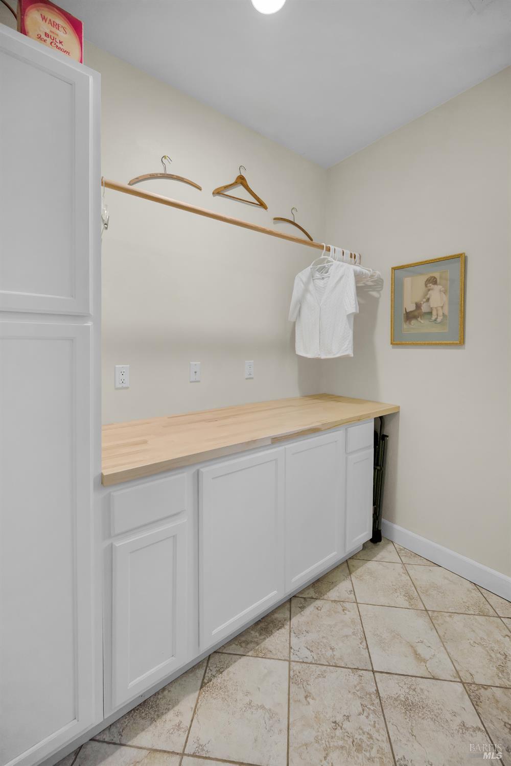3970 Canyon Road Willits, CA 95490 - Photo 28 of 67 a room with a cabinet and wooden floor