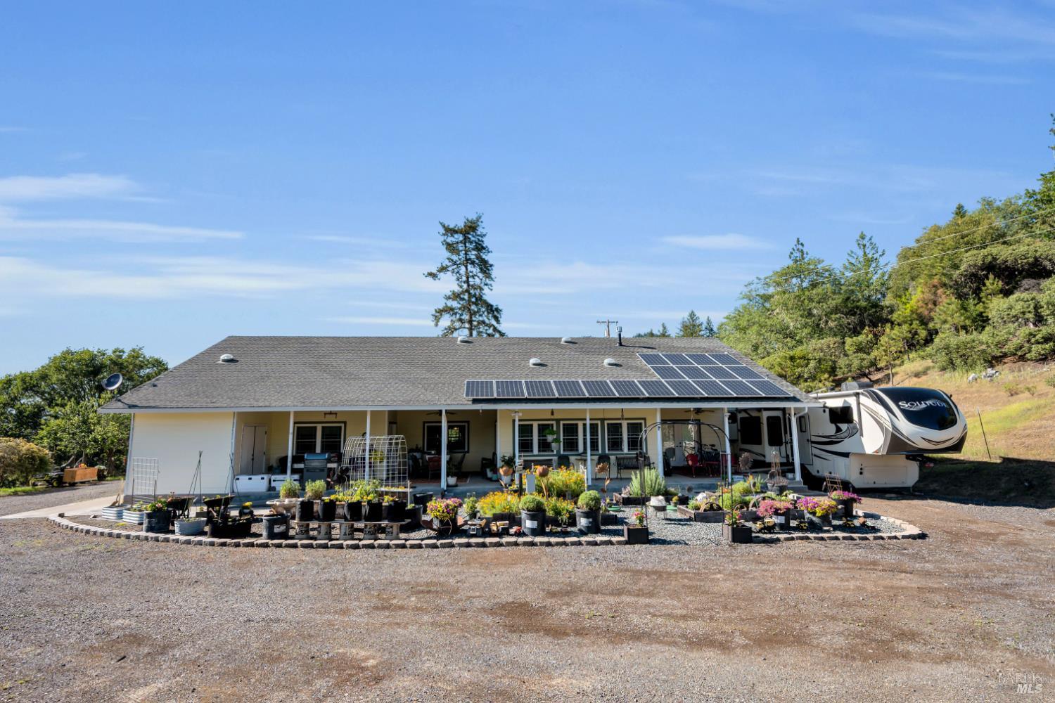 3970 Canyon Road Willits, CA 95490 - Photo 46 of 67 a view of a car parked in front of a house
