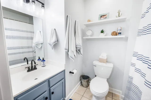 a close view of a sink and cabinets