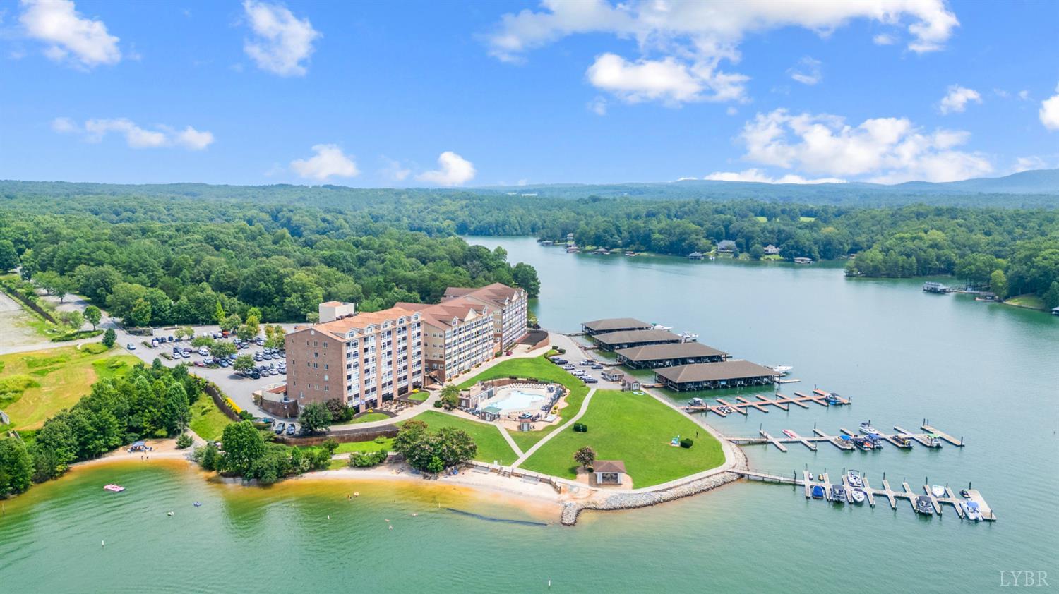 1245 Graves Harbor Trail, Unit 212 Huddleston, VA 24104 - Photo 2 of 60 a view of a lake in middle of the house