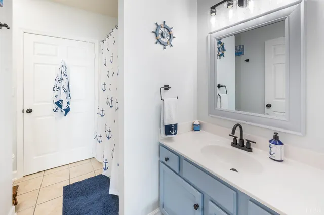 a view of a house with a yard balcony