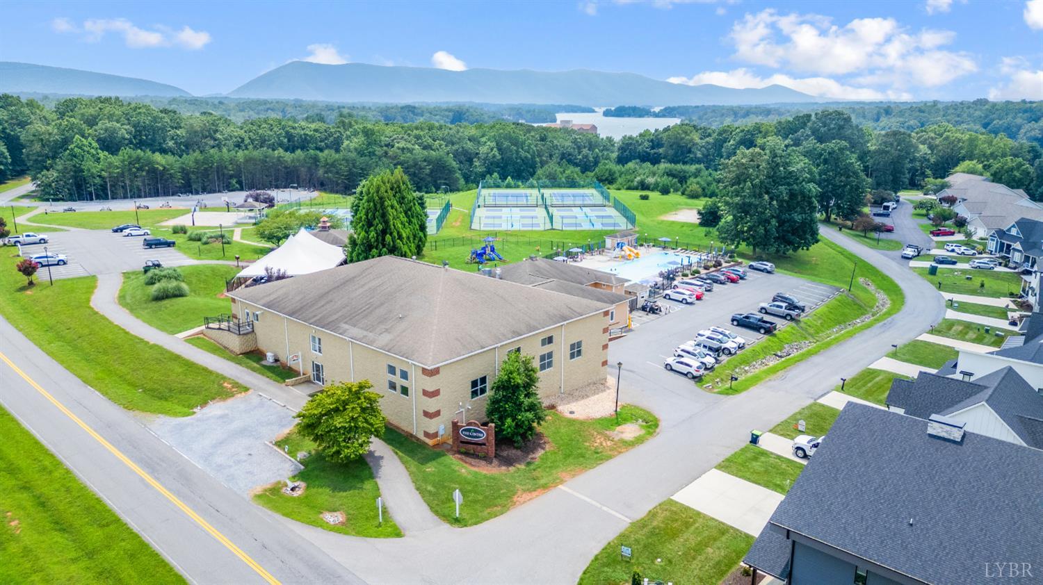 1245 Graves Harbor Trail, Unit 212 Huddleston, VA 24104 - Photo 51 of 60 an aerial view of a swimming pool patio and outdoor seating