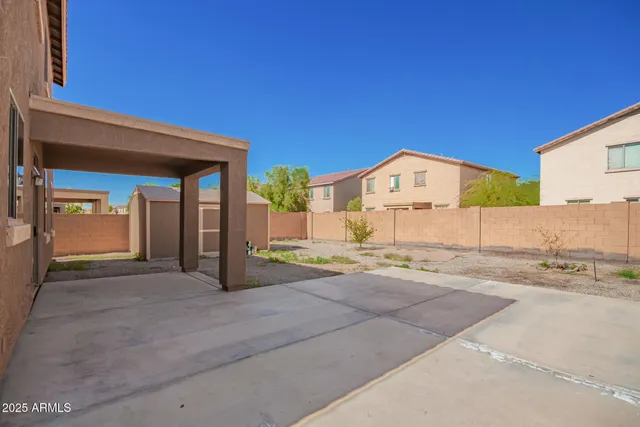 a view of backyard of house