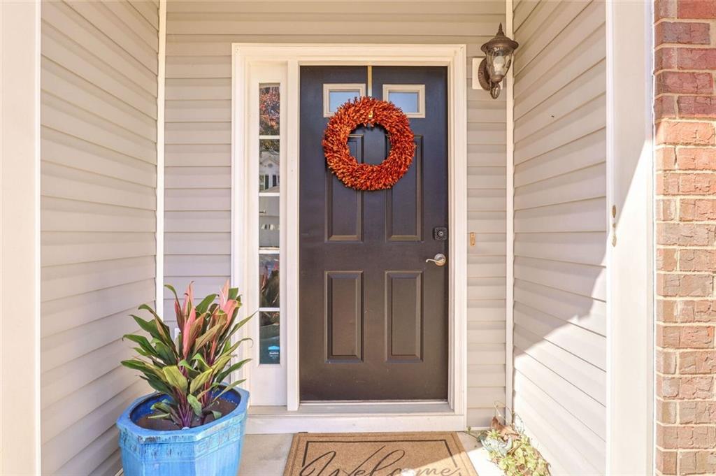 1622 Indian Way Cumming, GA 30040 - Photo 2 of 22 a view of a entryway door front of house