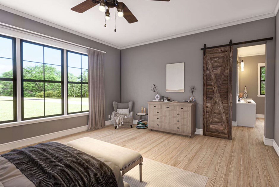 948 Jones Road New Waverly, TX 77358 - Photo 6 of 9 a spacious bedroom with a large bed and a window