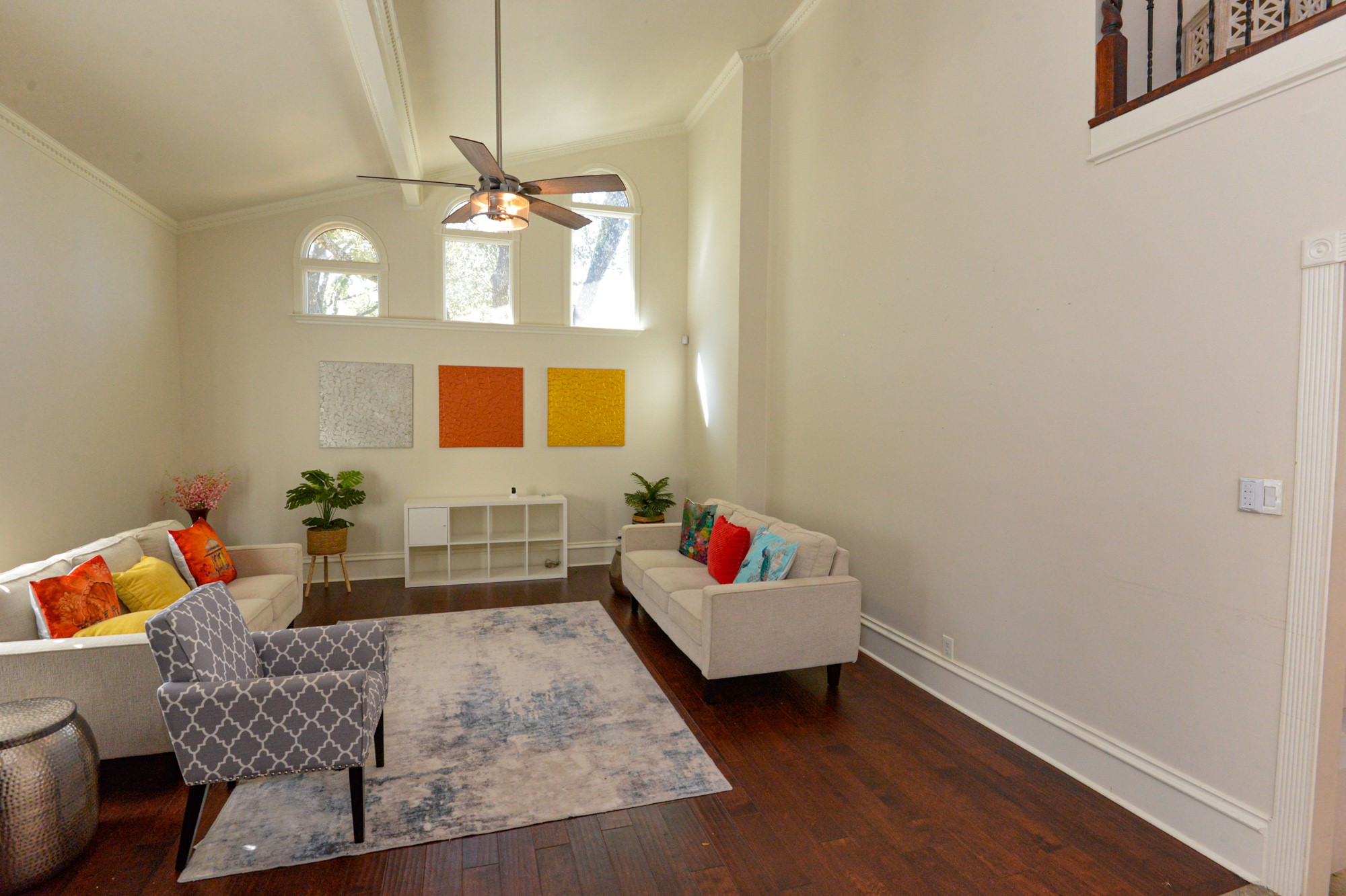 10710 D-K Ranch Road Austin, TX 78759 - Photo 30 of 34 Rich hardwood floors complement soaring ceilings in this inviting living area, perfect for gatherings.