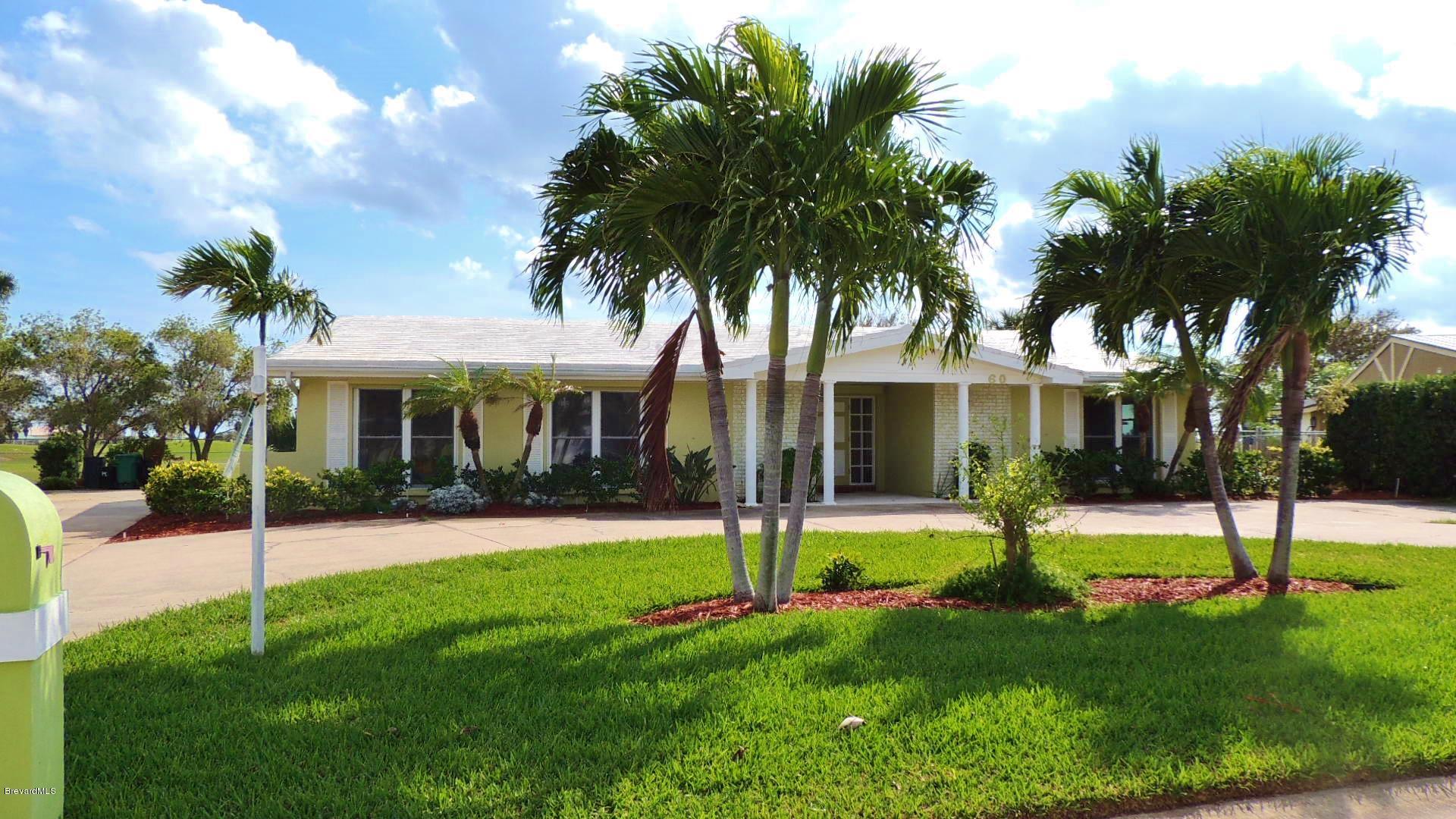 60 Country Club Road Cocoa Beach, FL 32931 - Photo 1 of 16 60 country club frt n
