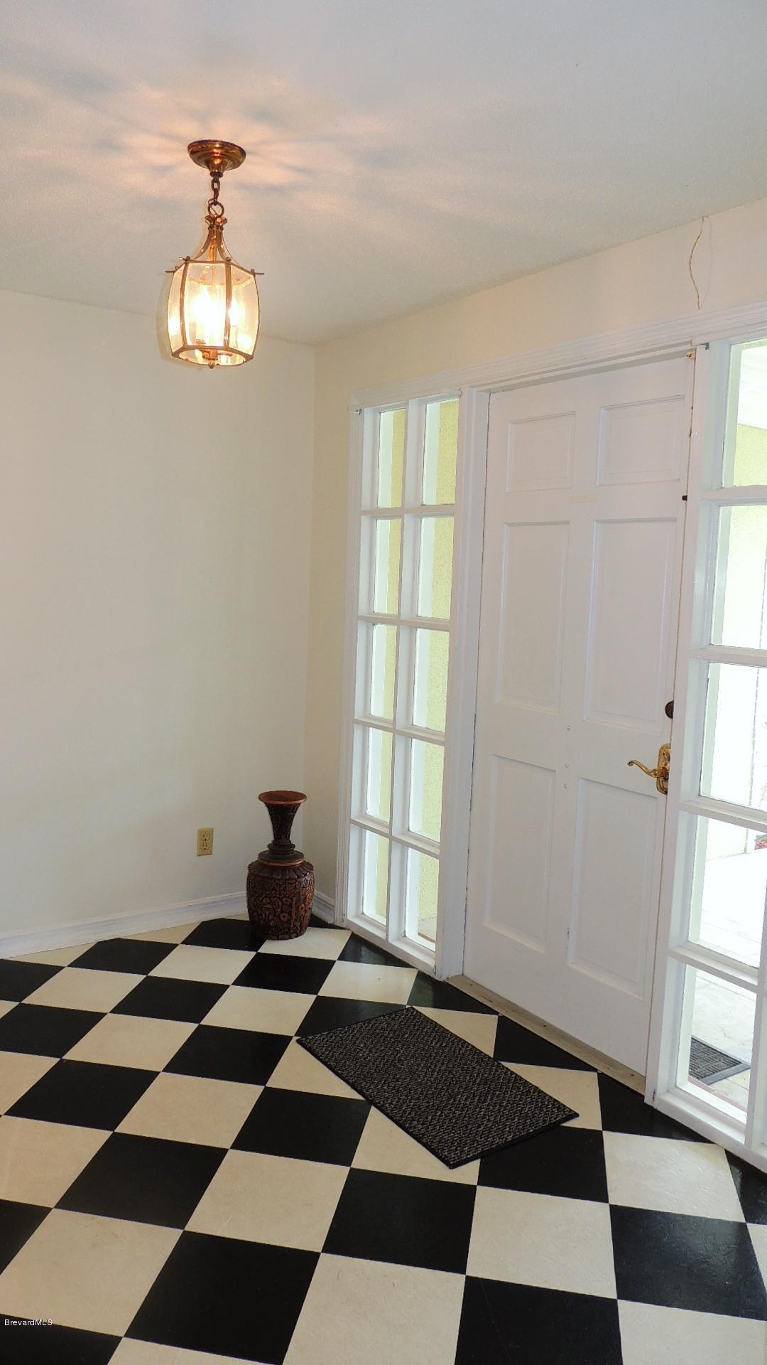 60 Country Club Road Cocoa Beach, FL 32931 - Photo 4 of 16 60 country club foyer n