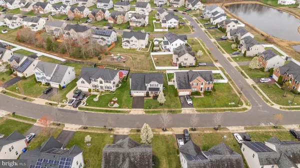 a view of swimming pool with outdoor seating