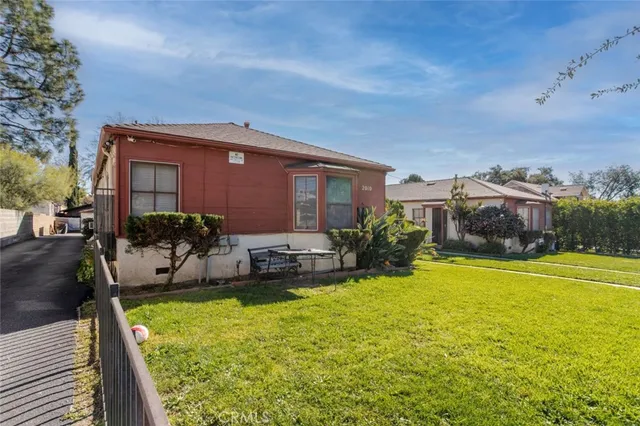 a front view of house with yard and seating area