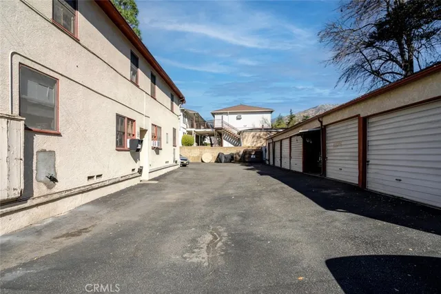 a view of a house with a street