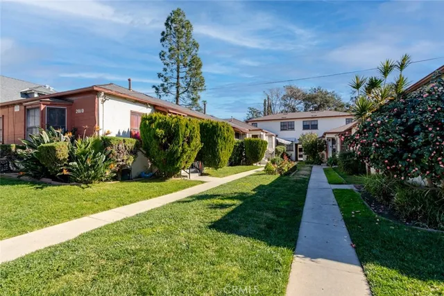 a view of a pathway with a yard